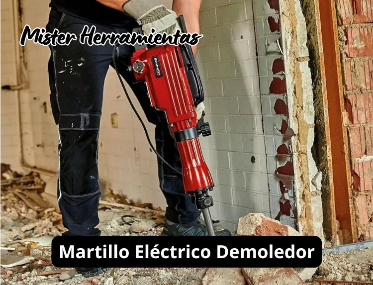 operario utilizando martillo eléctrico demoledor para romper hormigón en una obra