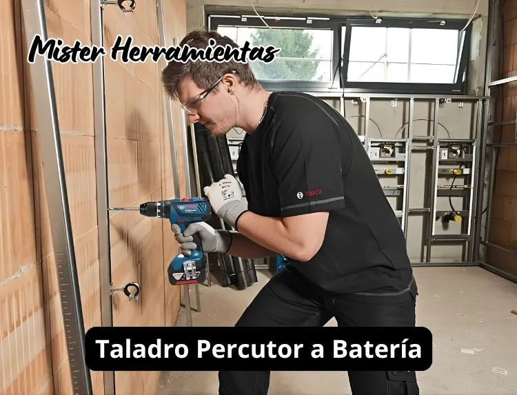 operario usando taladro percutor a batería Bosch profesional perforando pared de obra