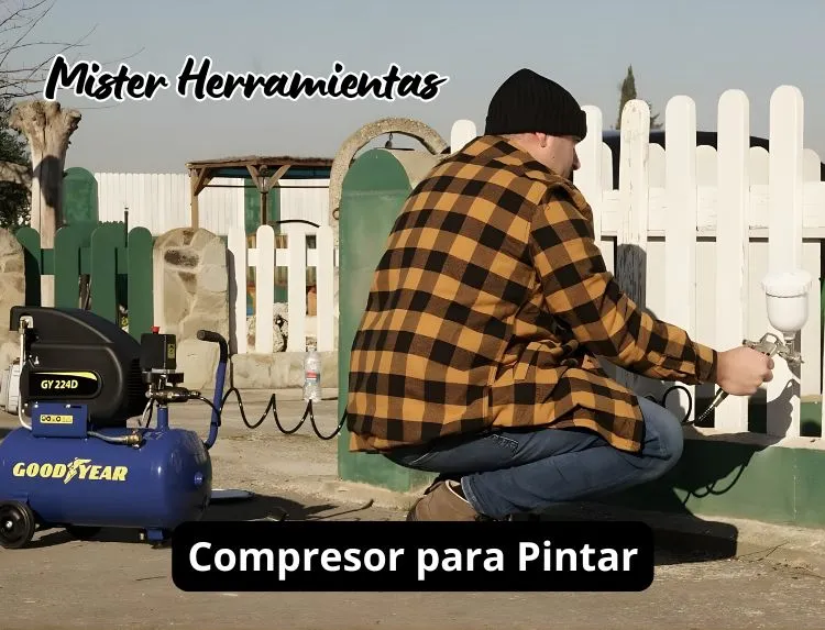 persona pintando una valla de madera con pistola y compresor de aire en exterior