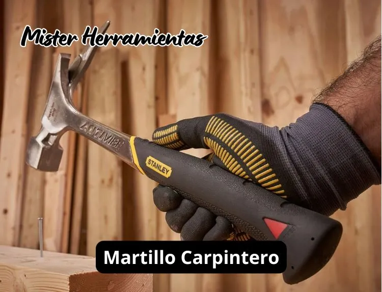 martillo de carpintero stanley fatmax sujetado con guante sobre madera